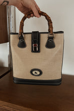 1990's DOONEY & BOURKE NAVY LEATHER BAMBOO HANDLE BAG | 9" x 9.5" x 2.5"