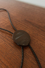 1970's BROWN AGATE ON BLACK WOVEN LEATHER BOLO