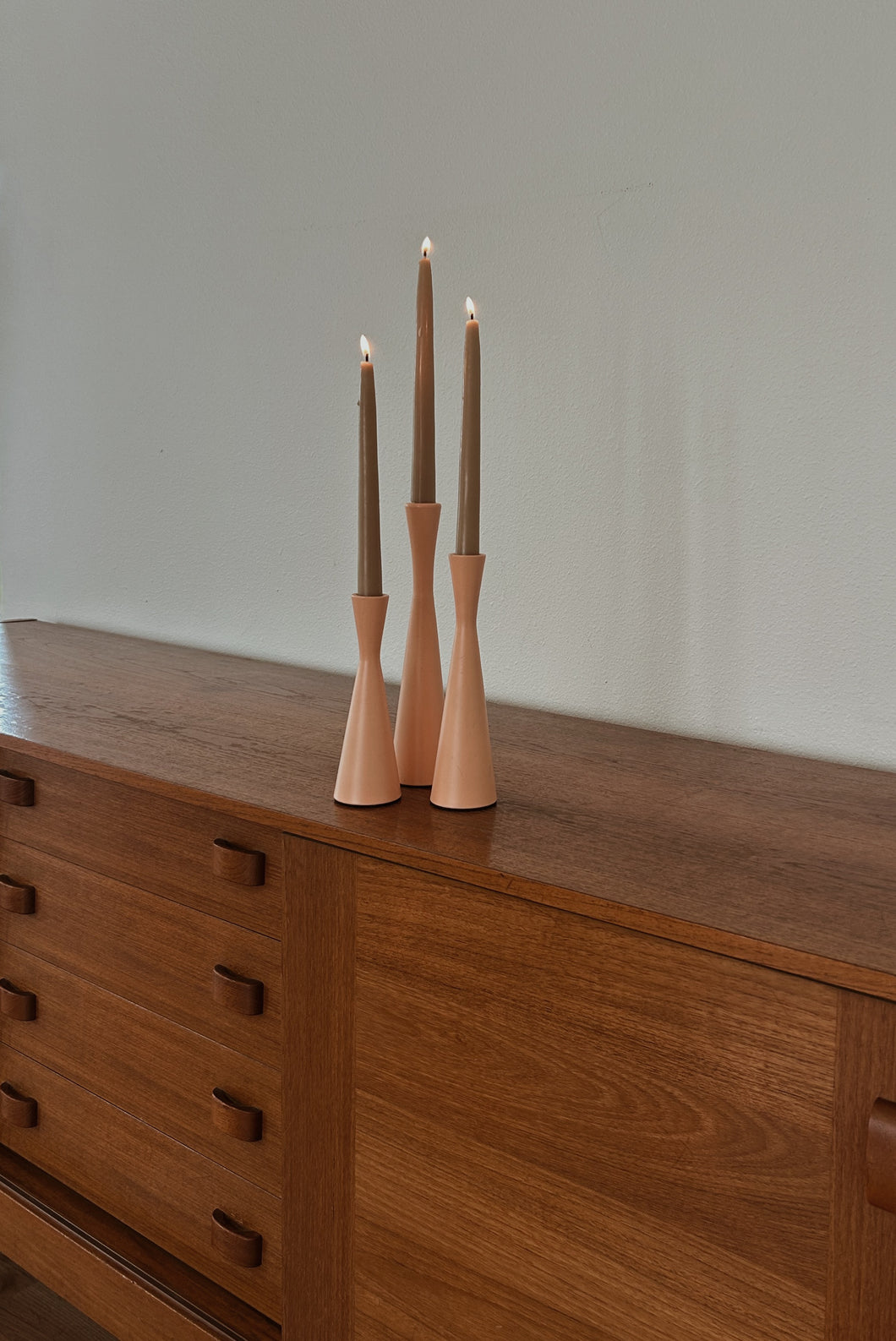 MID CENTURY STYLE PEACH PAINTED IRON CANDLE HOLDERS | SET OF THREE