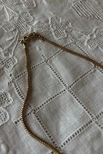 1980's BRASS COATED SHELL PENDANT ON GOLD VERMEIL CHAIN