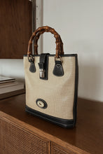 1990's DOONEY & BOURKE NAVY LEATHER BAMBOO HANDLE BAG | 9" x 9.5" x 2.5"