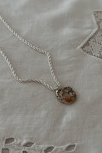 1990's MOTHER OF PEARL SHELL PENDANT ON SILVER PLATE TWIST CHAIN