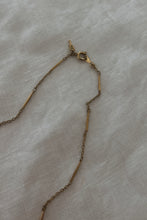 1940's BLACK + GOLD DAMASCENE PENDANT ON 1970's GOLD FILL CHAIN