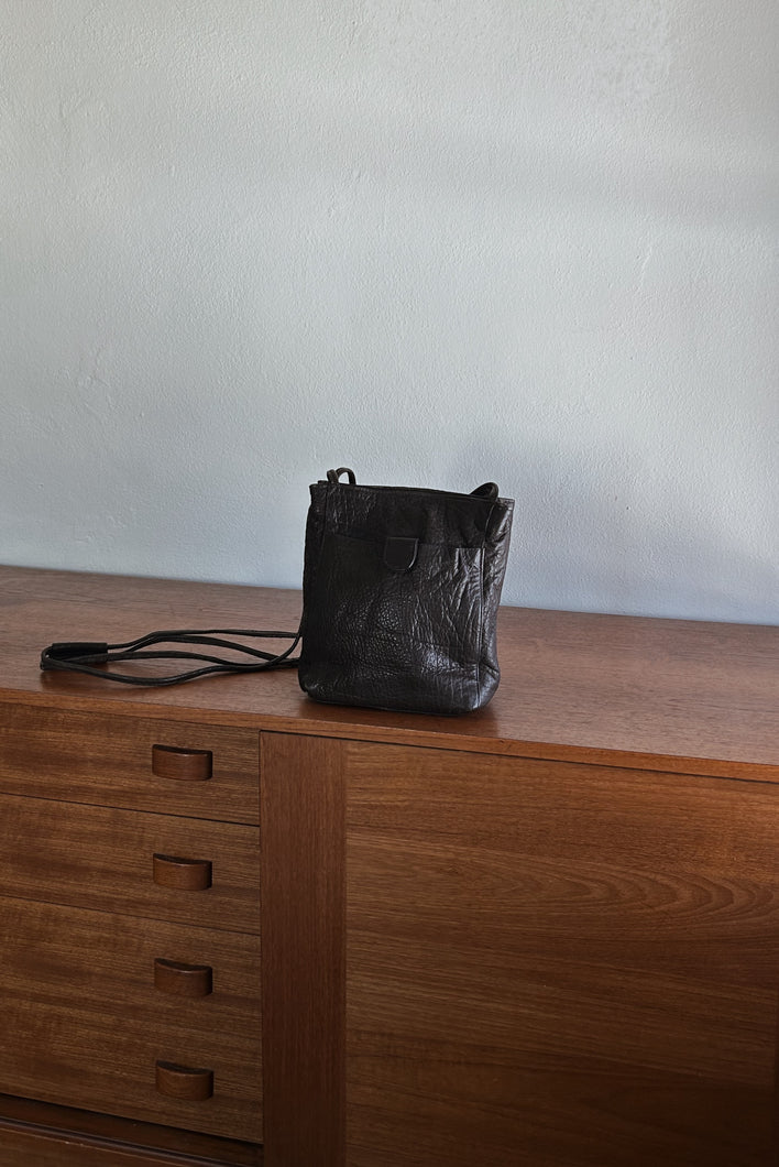 1990's WILSONS BLACK PEBBLED LEATHER BAG