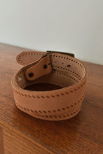 1970's BRASS CORVETTE ON STITCHED LEATHER BELT | SIZE M/L