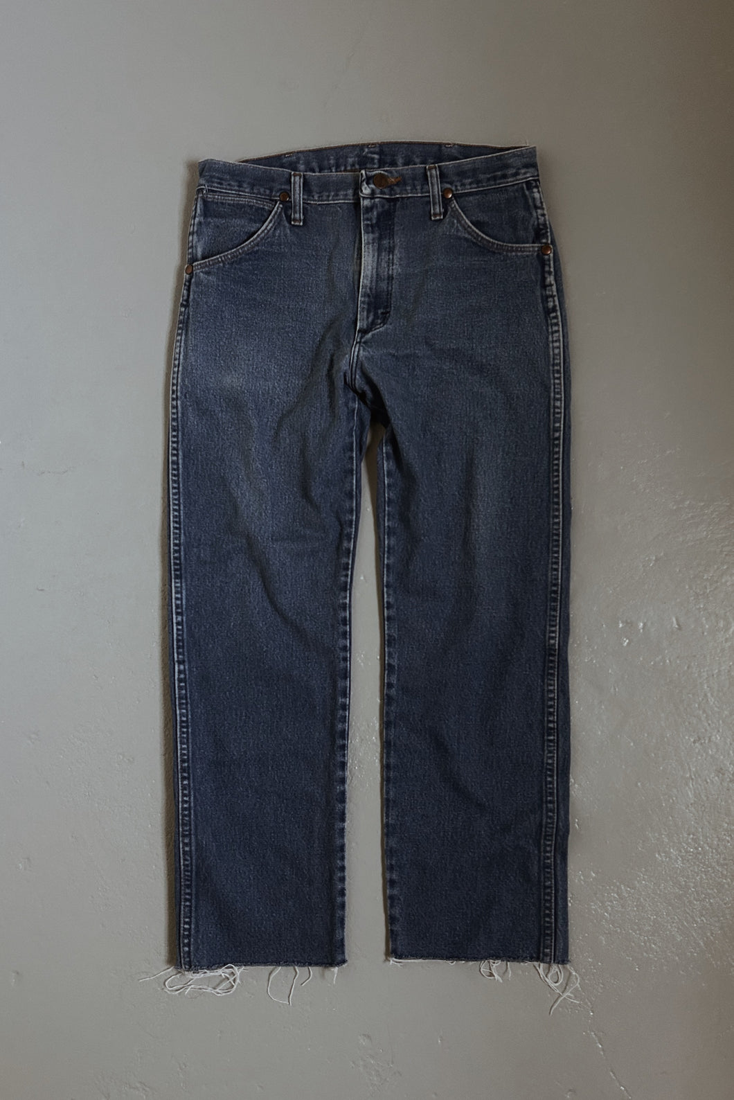 1980's WRANGLER COWBOY RAW HEM DENIM | SIZE 28