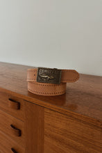 1970's BRASS CORVETTE ON STITCHED LEATHER BELT | SIZE M/L