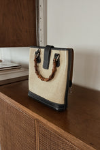 1990's DOONEY & BOURKE NAVY LEATHER BAMBOO HANDLE BAG | 9" x 9.5" x 2.5"