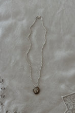 1990's MOTHER OF PEARL SHELL PENDANT ON SILVER PLATE TWIST CHAIN
