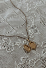 1990's 12 K GOLD FILL BOW LOCKET