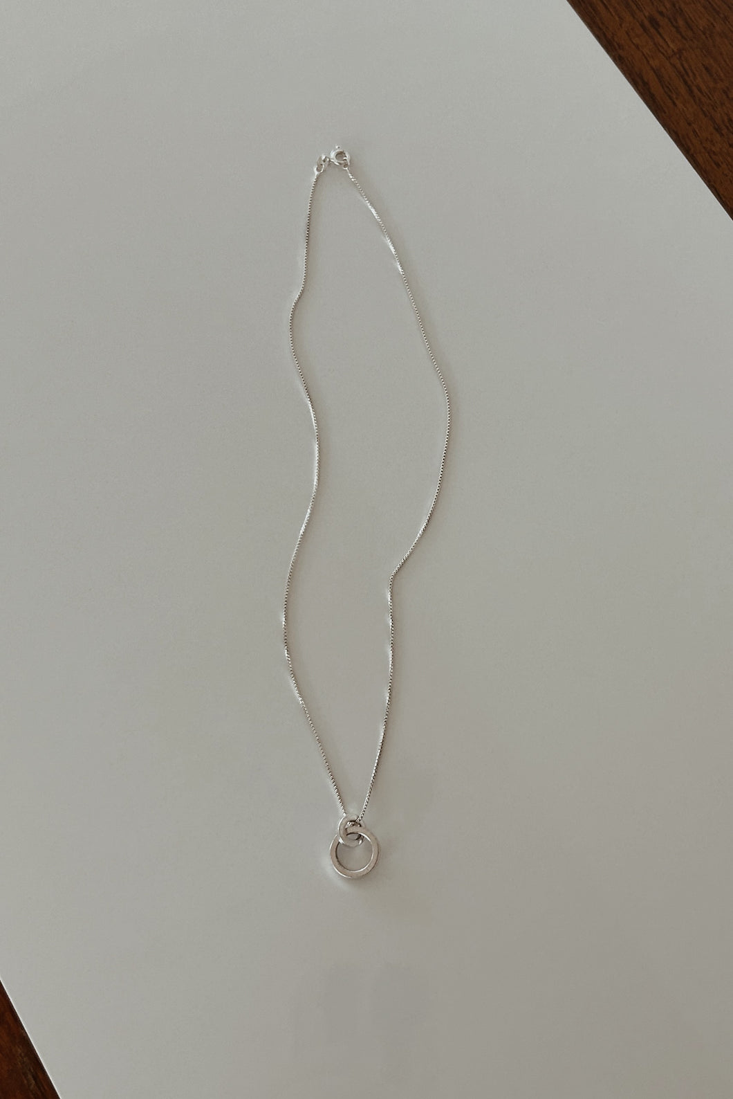 1980's 925 STERLING LOOP PENDANT ON STERLING SILVER CHAIN