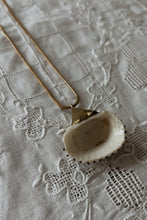1980's BRASS COATED SHELL PENDANT ON GOLD VERMEIL CHAIN