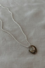 1990's MOTHER OF PEARL SHELL PENDANT ON SILVER PLATE TWIST CHAIN