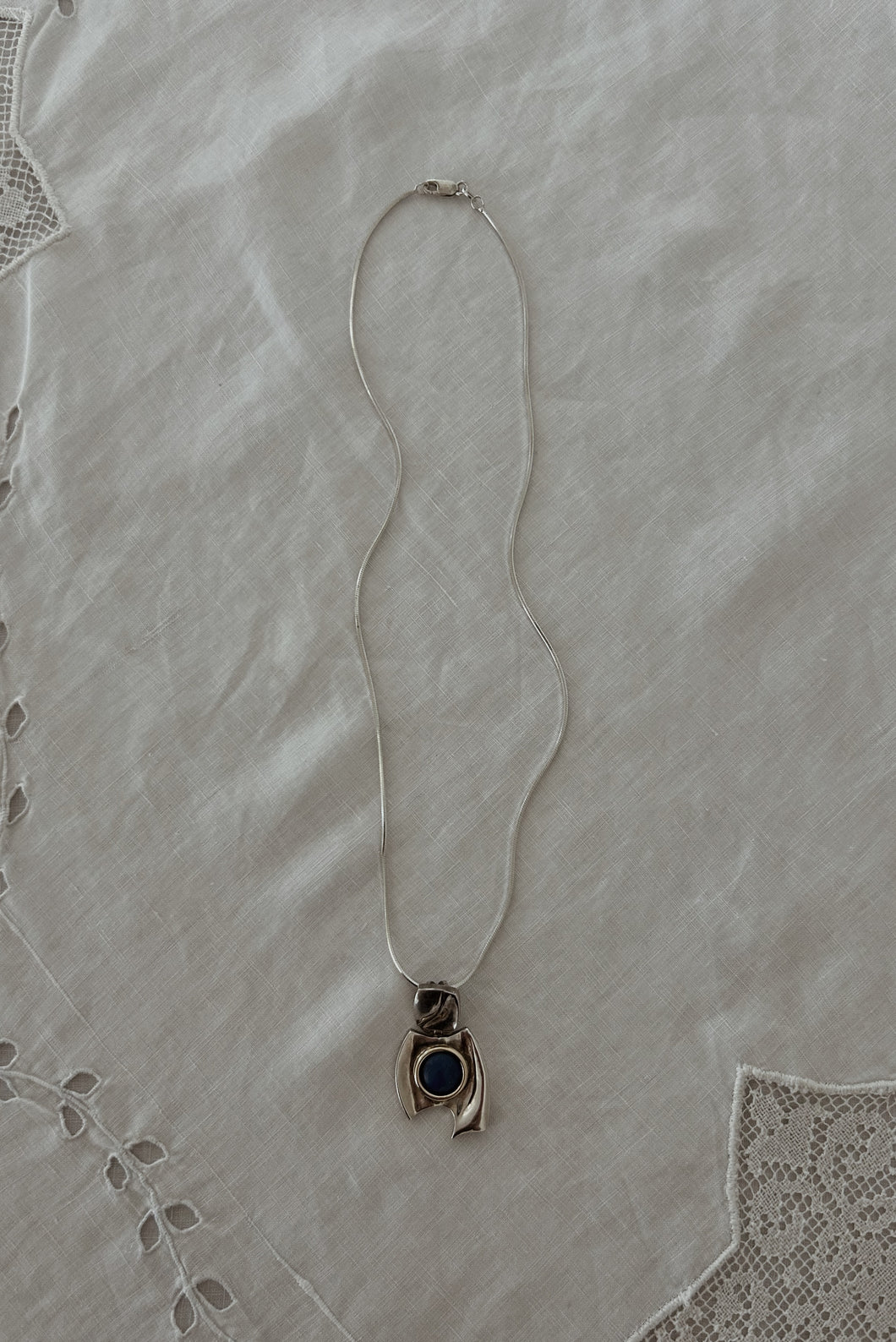 1980's STERLING SILVER MODERNIST LAPIS PENDANT ON LIQUID STERLING CHAIN