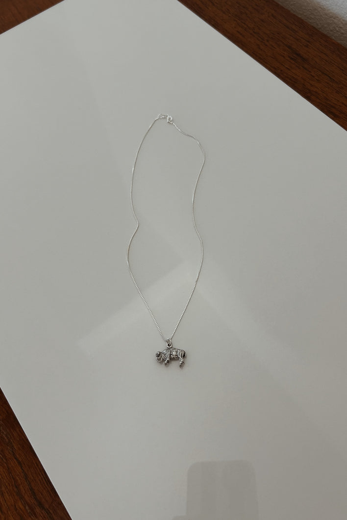 1970's BUFFALO PENDANT ON STERLING SILVER CHAIN