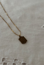 1930's BRASS RUNNER PENDANT ON 1970's GOLD FILL CHAIN